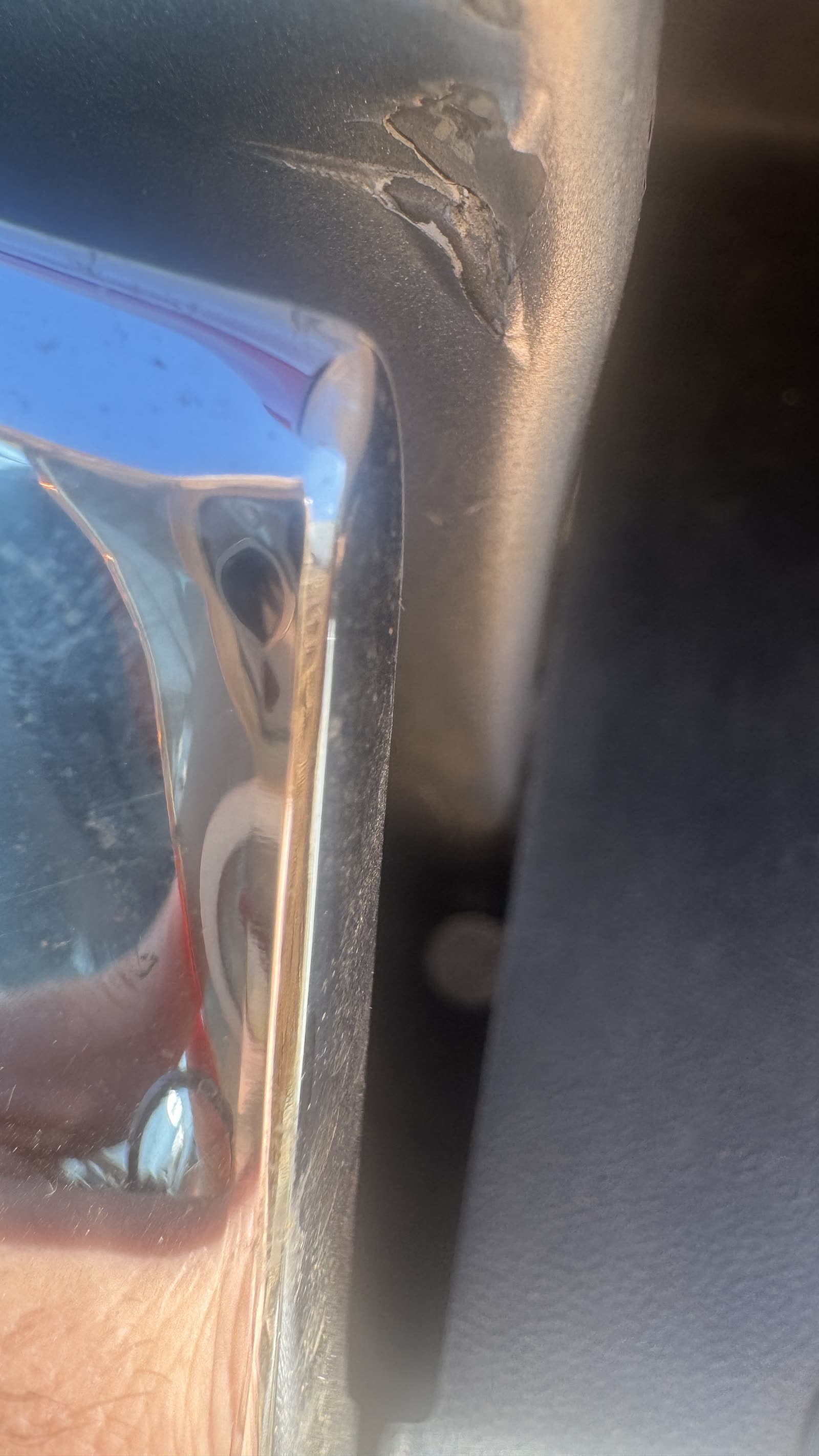 Close-up of bumper impact damage