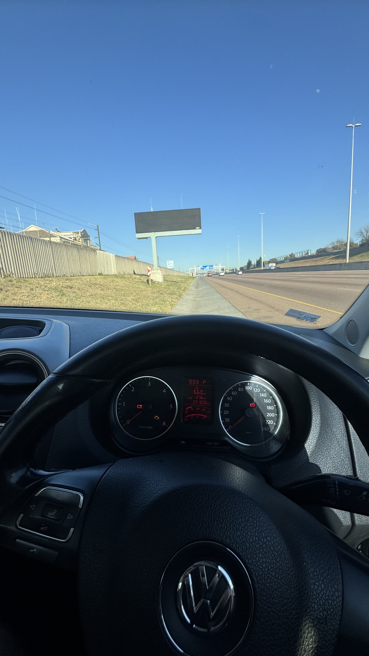 View from driver's seat, stranded on the highway shoulder
